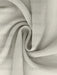 Close-up of the soft ivory chiffon fabric used for the overlay
