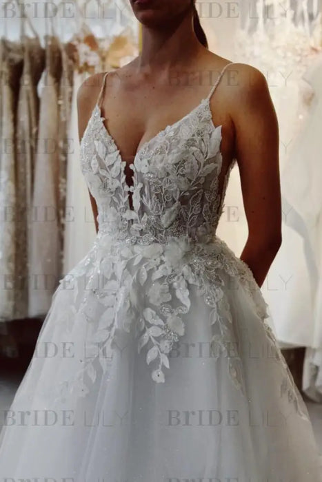 A Line Spaghetti Straps V-Neck Backless Tulle Applique Wedding Dresses
