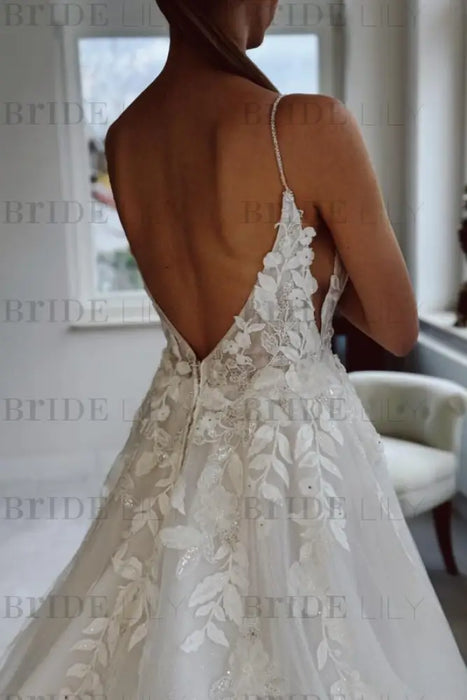 A Line Spaghetti Straps V-Neck Backless Tulle Applique Wedding Dresses