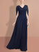 Navy chiffon gown with split cape sleeves and a draped panel