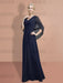 Full length view of the navy chiffon cape sleeve gown