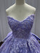 Purple lace dress on a mannequin against a neutral background