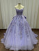 Lavender evening gown with floral embellishments on a mannequin against a plain background