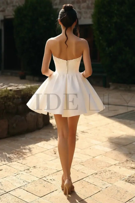 sleeveless off the shoulder women's short white wedding dresses Elegant Tea-Length Simple Dress UQW002 Uniquedresss Picture a vision of bridal unrivaled beauty captured in this delicate KissProm A-Line Off-The-Shoulder Sleeveless Short