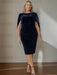 Plus size navy velvet dress with a cowl neck and cape sleeves