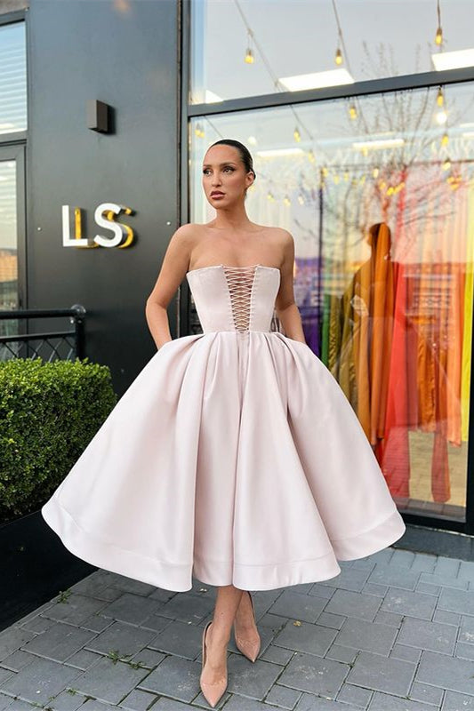 Chic and Flirty Strapless A-Line Prom Dress with Convenient Pockets