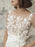 White Short Wedding Dresses Illusion Neckline Jewel Neck Short Sleeves Sheath Natural Waist Lace Bows Cut-Outs Ruffles Bridal Dresses